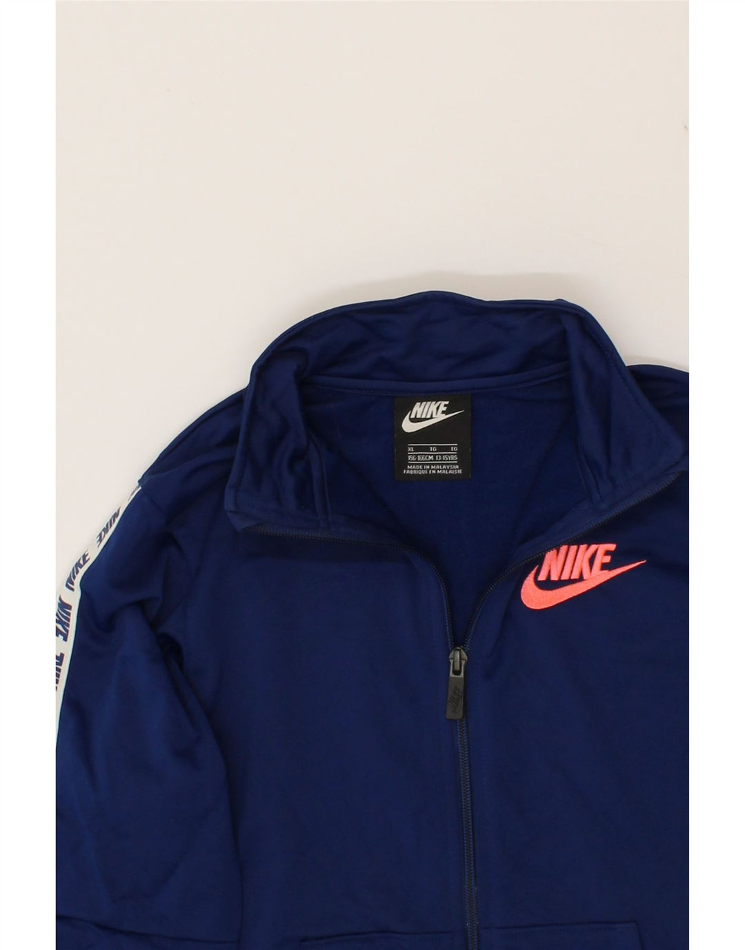 NIKE Girls Graphic Tracksuit Top Jacket 14-15 Years Navy Blue Polyester Vintage Nike and Second-Hand Nike from Messina Hembry 
