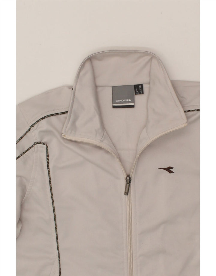 DIADORA Womens Loose Fit Tracksuit Top Jacket UK 10 Small White Polyester Vintage Diadora and Second-Hand Diadora from Messina Hembry 