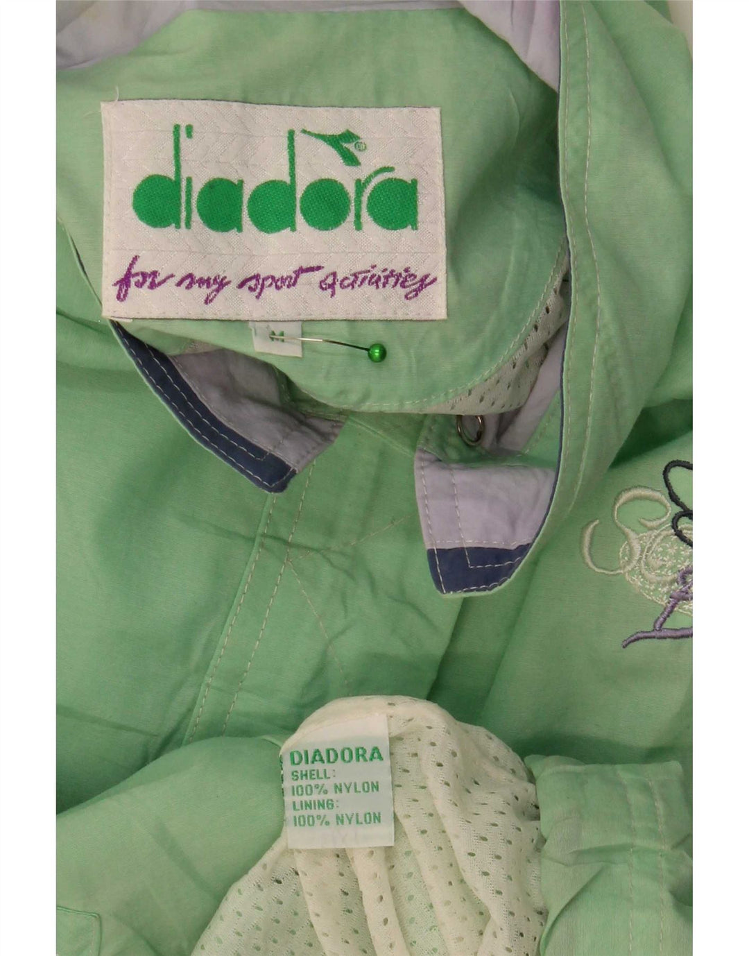 Jachetă de ploaie supradimensionată pentru femei Diadora UK 14, nailon verde mediu