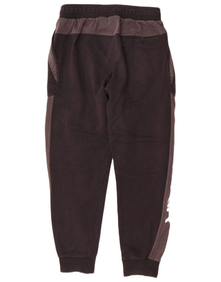 Pantaloni de trening grafic Nike pentru bărbați Joggeri, medii, negru, color block