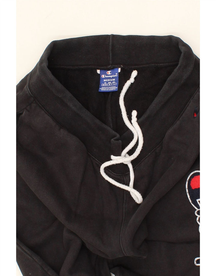 CHAMPION Mens Graphic Tracksuit Trousers Joggers Medium  Black Cotton Vintage Champion and Second-Hand Champion from Messina Hembry 