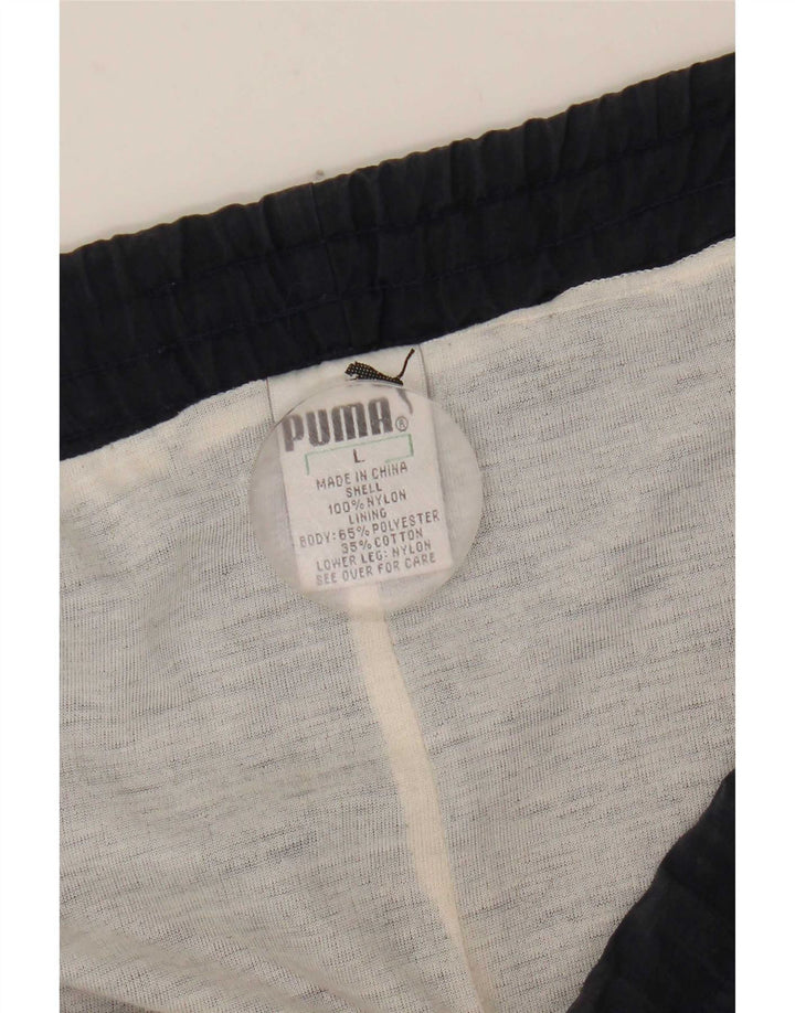 Pantaloni de trening Puma pentru bărbați, nailon mari bleumarin