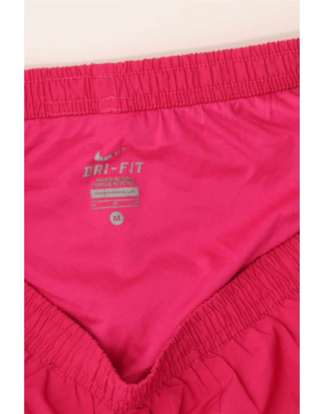 NIKE Womens Dri Fit Sport Shorts UK 14 Medium  Pink Colourblock Polyester Vintage Nike and Second-Hand Nike from Messina Hembry 