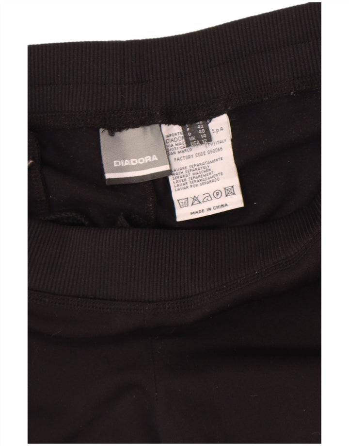 Pantaloni de trening Diadora pentru femei UK 14 Poliester mediu negru