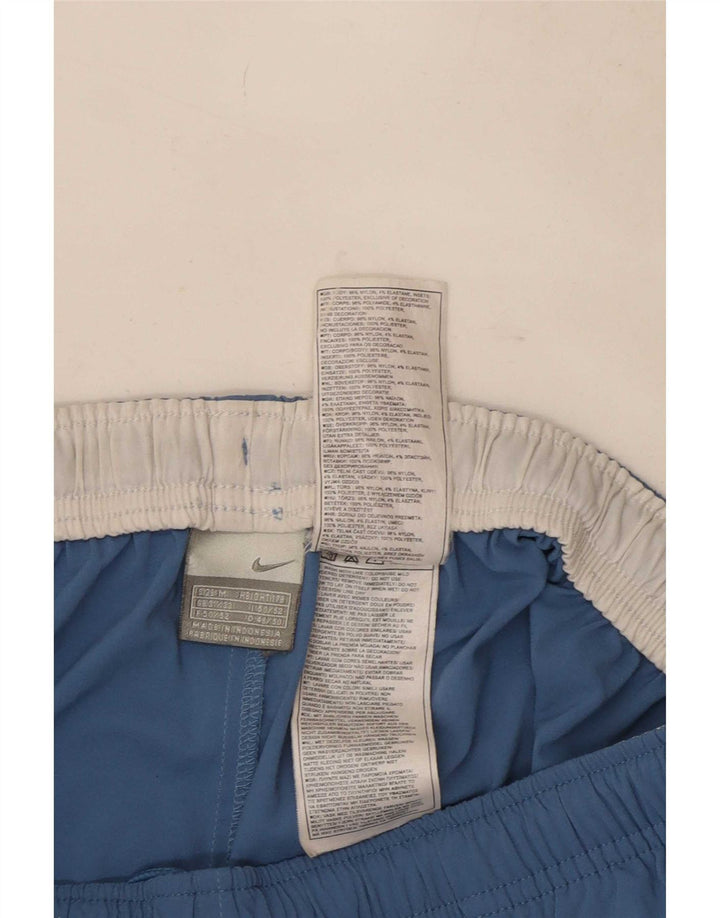 Pantaloni de trening Nike pentru bărbați, nailon cu dungi albastre medii