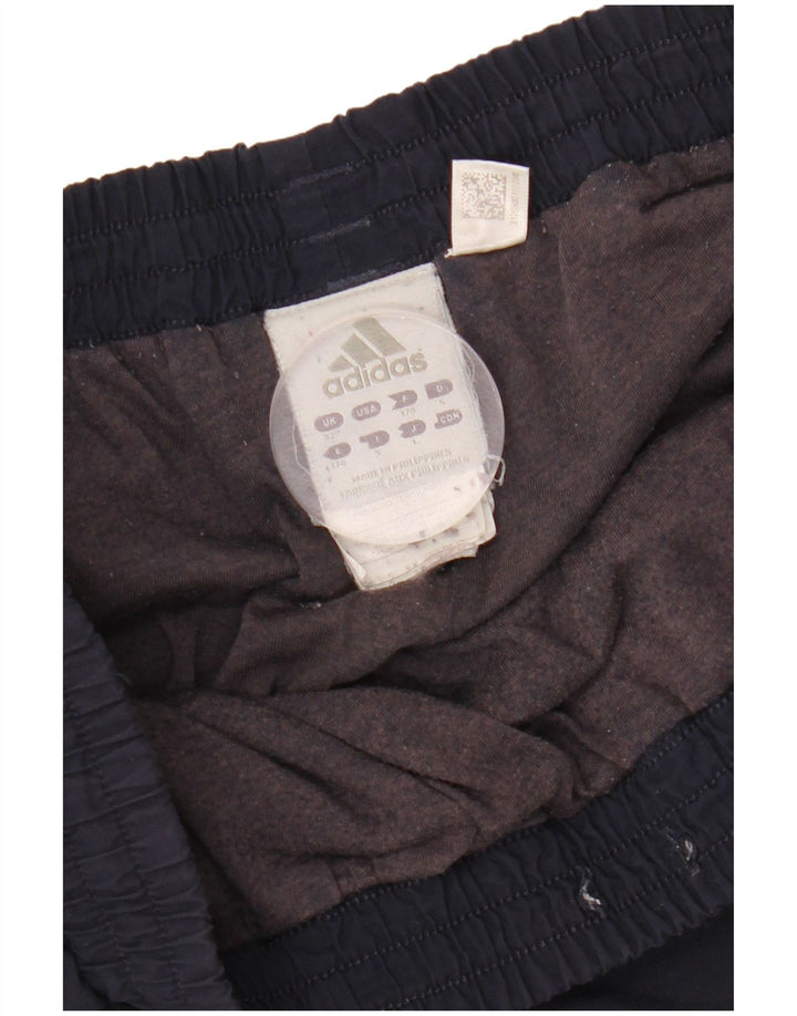 Pantaloni de trening pentru bărbați ADIDAS Morcov Pantaloni de jogging Mediu Poliester bleumarin