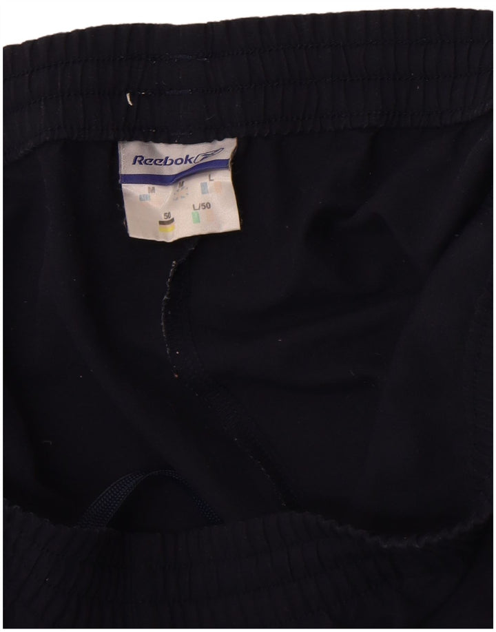 Pantaloni de trening pentru bărbați Reebok Pantaloni de jogging Medium Bleumarin