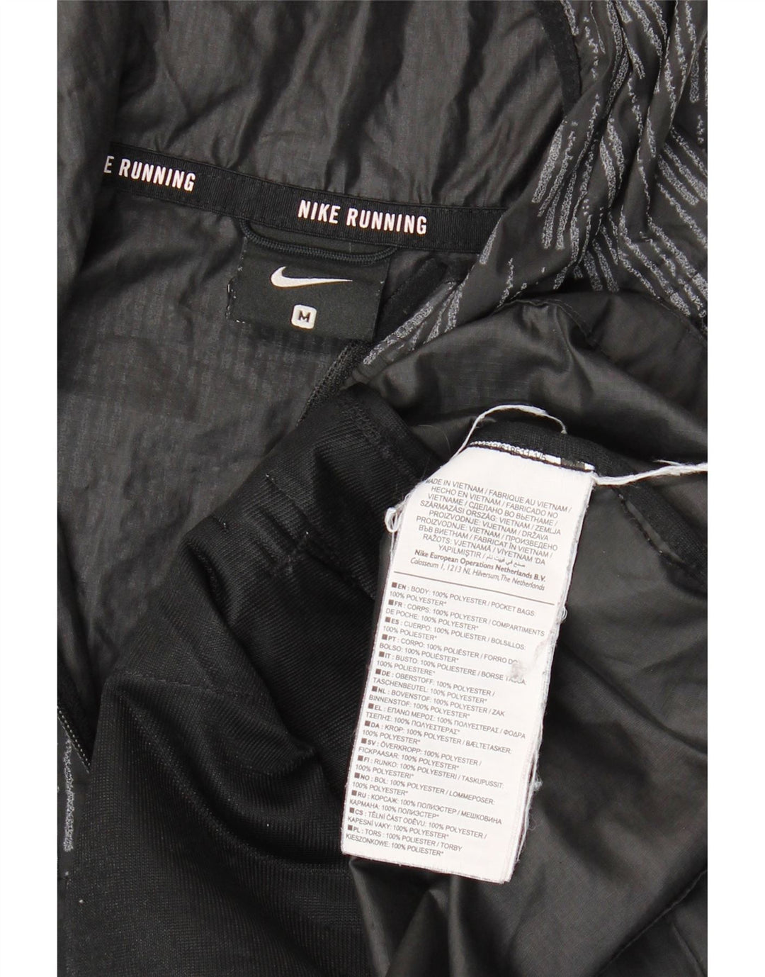 Jachetă de ploaie NIKE pentru alergare pentru femei UK 14 Medium Negru Geometric