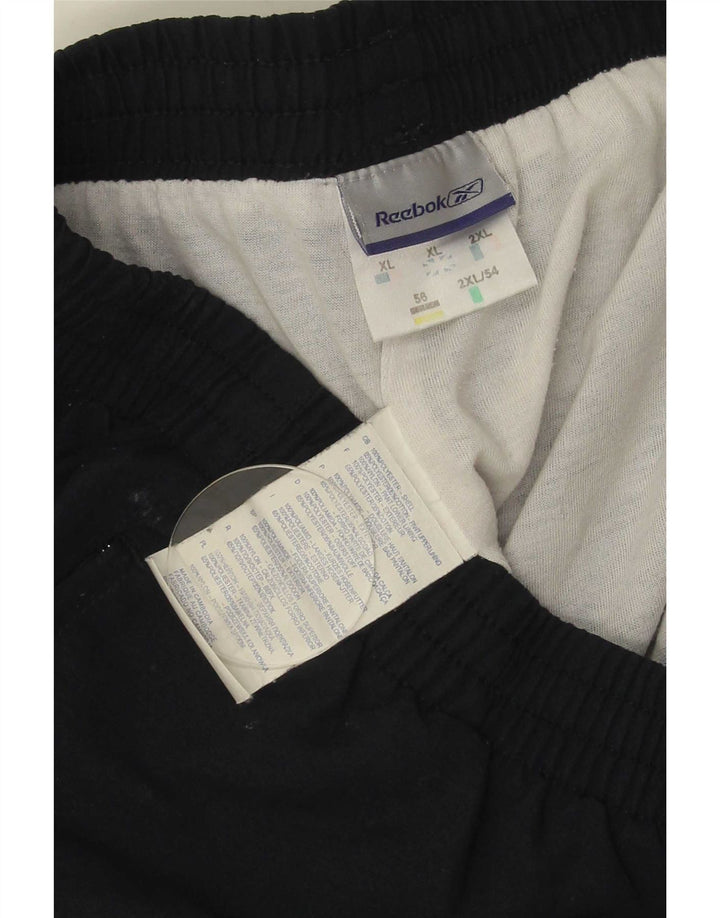 Pantaloni de trening pentru bărbați Reebok Pantaloni de jogging XL Bleumarin Poliester