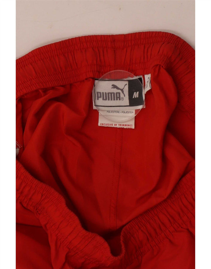Pantaloni de trening Puma Graphic Capri pentru bărbați, poliester roșu mediu
