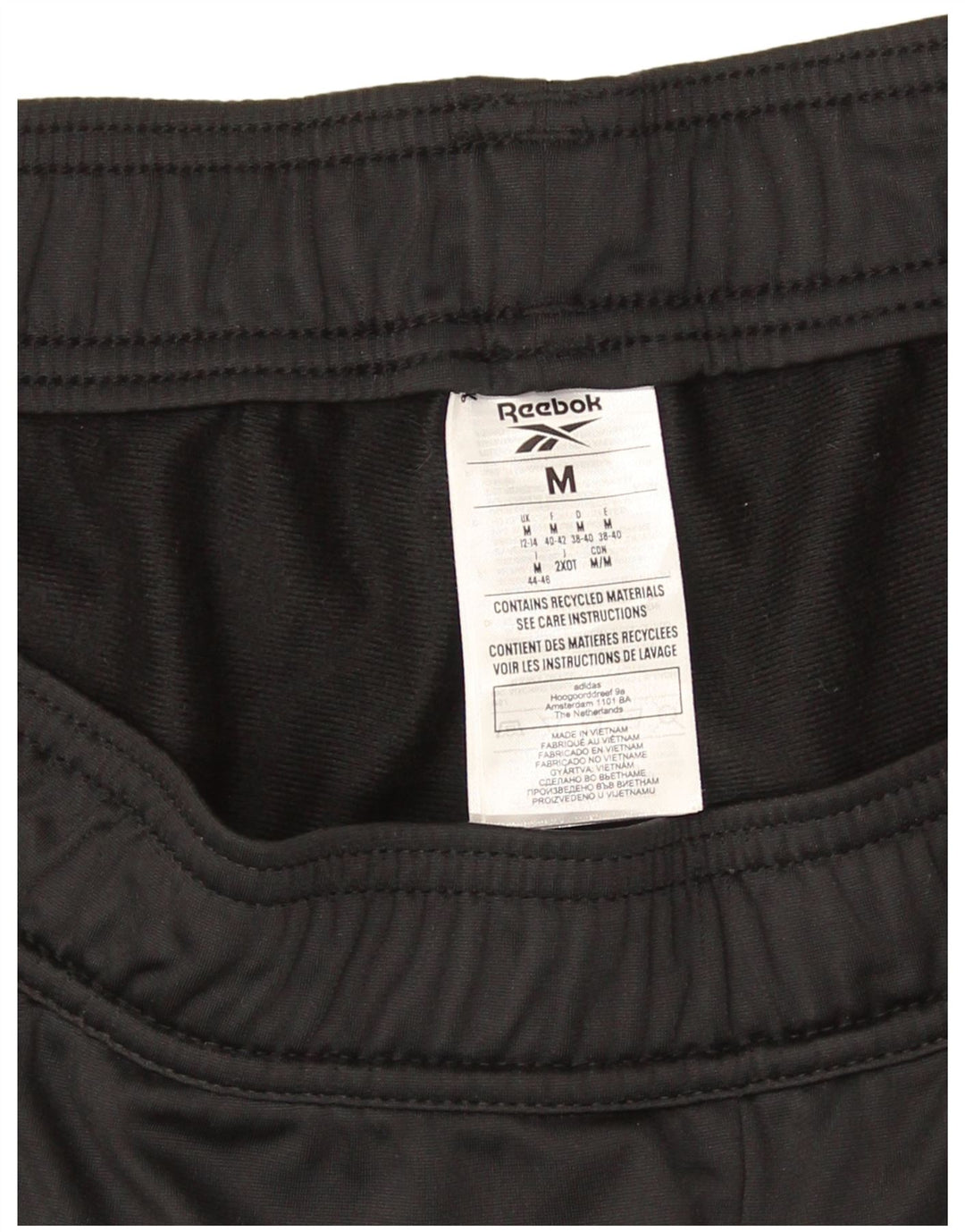 Pantaloni de trening pentru femei Reebok Pantaloni de jogging UK 12/14 Poliester mediu negru