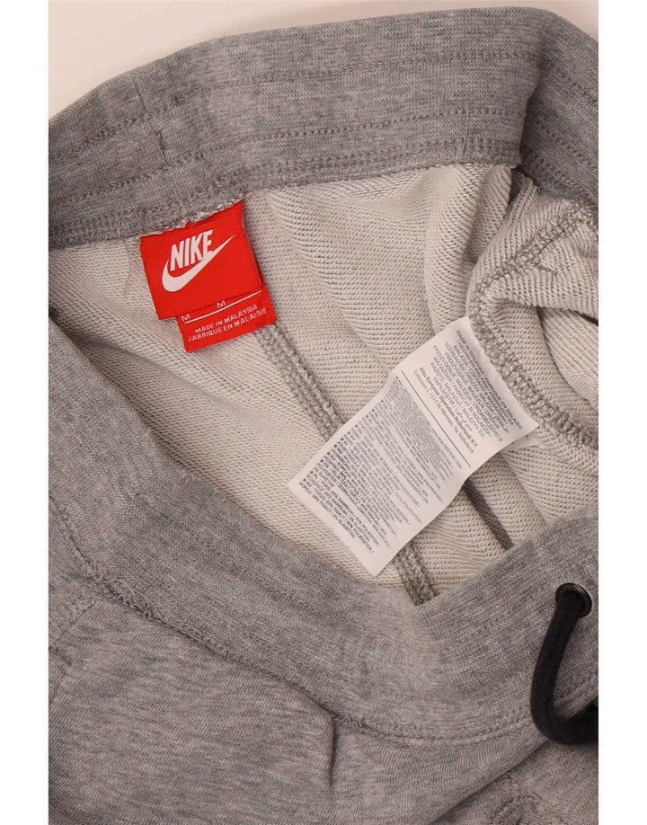 Pantaloni de trening grafic Nike pentru bărbați Joggeri din bumbac gri mediu