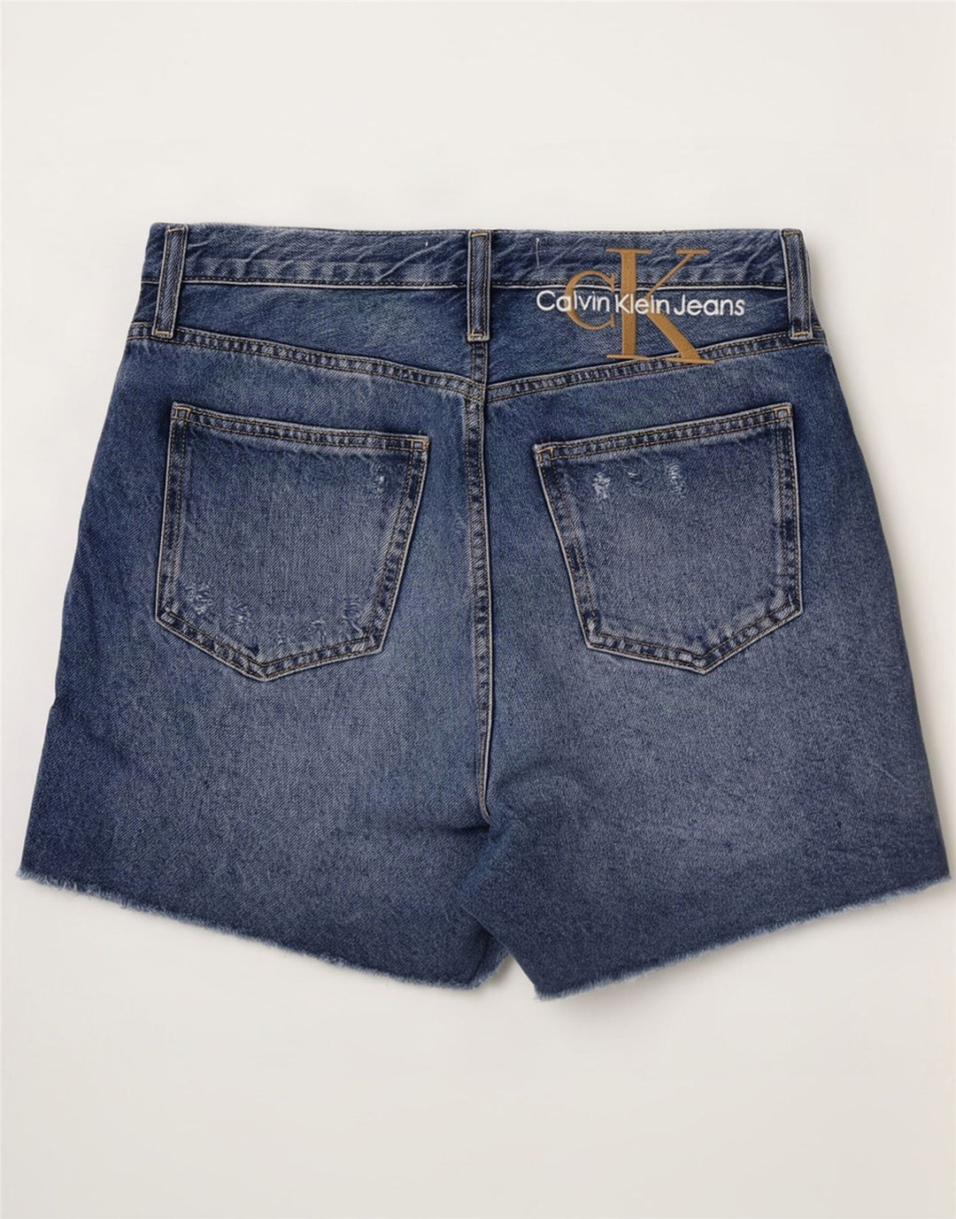 Pantaloni scurți Calvin Klein din denim distressed W29, bumbac albastru mediu