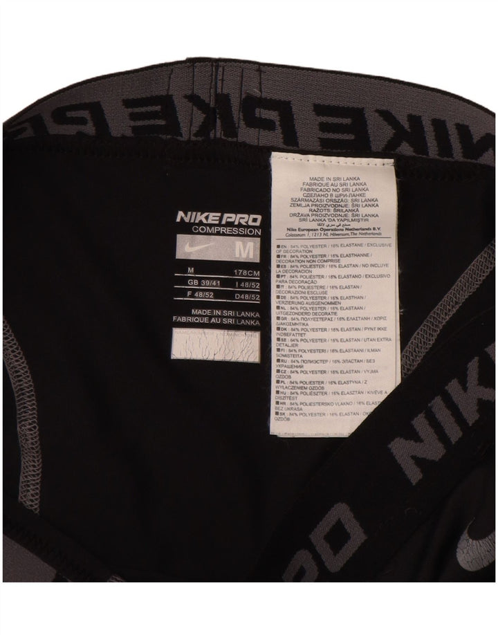 Leggings grafic Nike pentru bărbați Marea Britanie 39/41 Poliester mediu negru