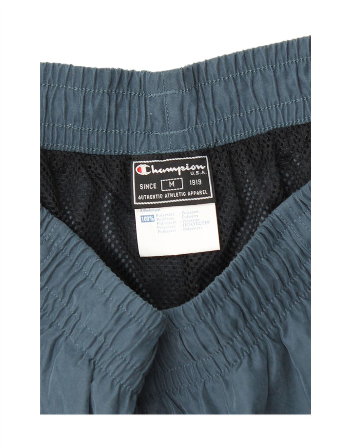 Pantaloni de trening cargo pentru bărbați CHAMPION, poliester mediu albastru bleumarin