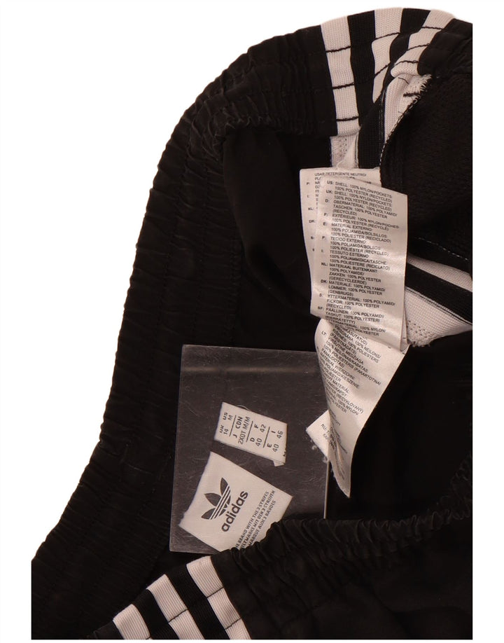 Pantaloni de trening Adidas pentru femei Joggeri UK 14 Poliester negru mare