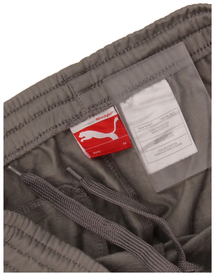 Pantaloni de trening Puma Graphic pentru băieți 9-10 ani, gri mediu, color block