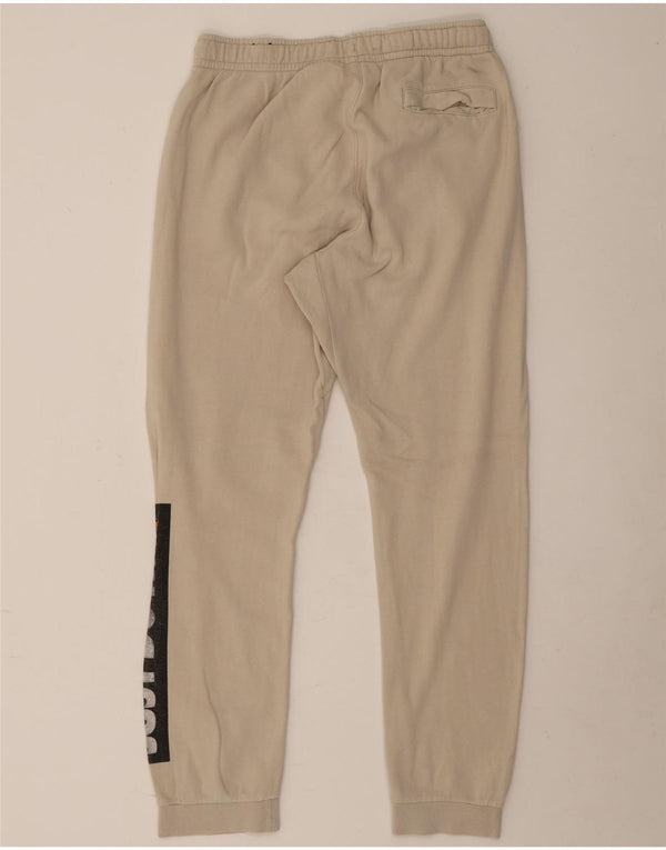 Pantaloni de trening grafic Nike pentru bărbați Joggeri mari, bej, bumbac
