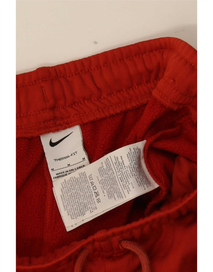Pantaloni de trening Nike Therma-Fit Graphic pentru bărbați, poliester roșu mediu