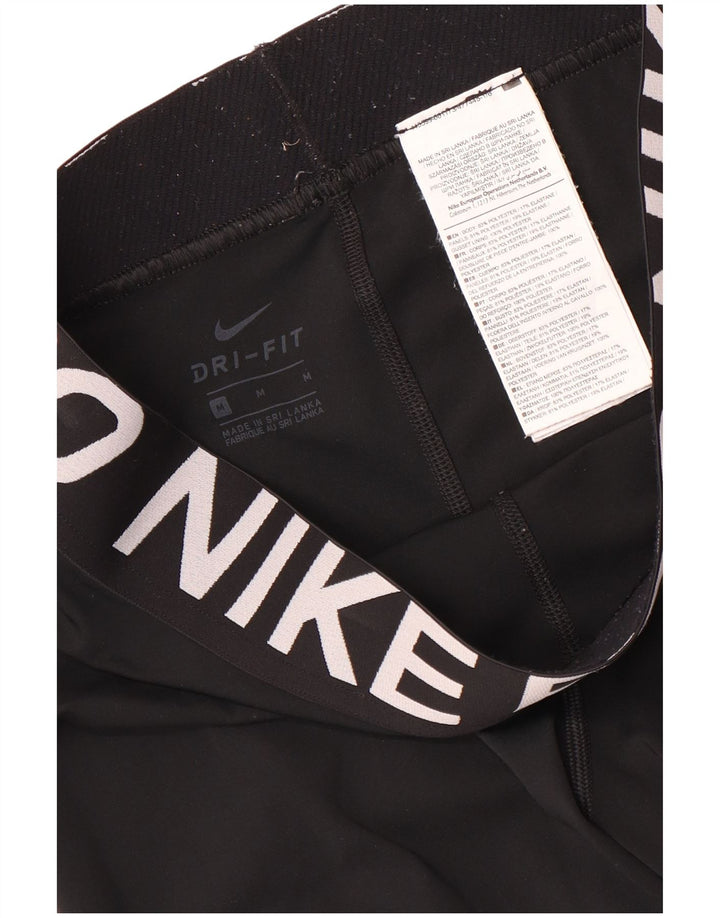 Leggings Nike Dri Fit Graphic Capri pentru femei UK 12 Poliester mediu negru