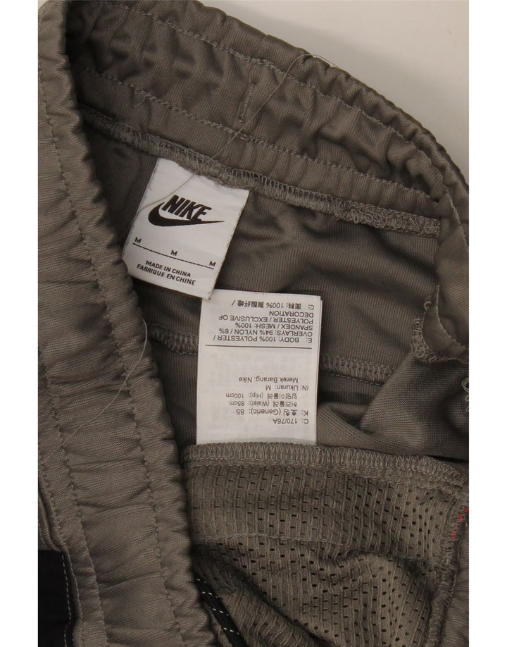 Pantaloni de trening pentru bărbați NIKE Pantaloni de jogging Gri mediu Poliester color bloc