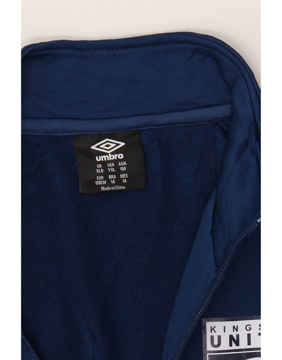 UMBRO Boys Graphic Tracksuit Top Jacket 13-14 Years XL Navy Blue Polyester Vintage Umbro and Second-Hand Umbro from Messina Hembry 