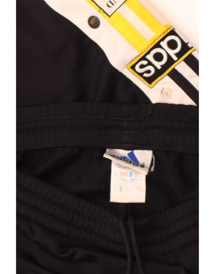 Pantaloni de trening grafic pentru bărbați Adidas, negru mediu, poliester bloc de culoare