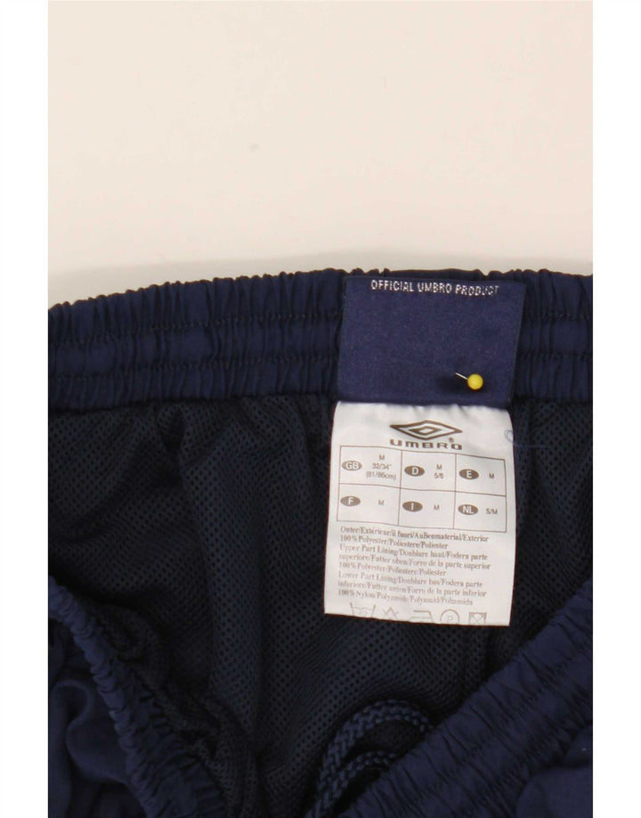 Pantaloni de trening pentru bărbați Umbro Pantaloni de jogging Mediu Nailon bleumarin