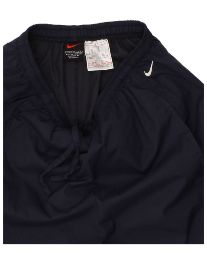 NIKE Womens Tracksuit Trousers US 4/6 Small  Navy Blue Polyester Vintage Nike and Second-Hand Nike from Messina Hembry 