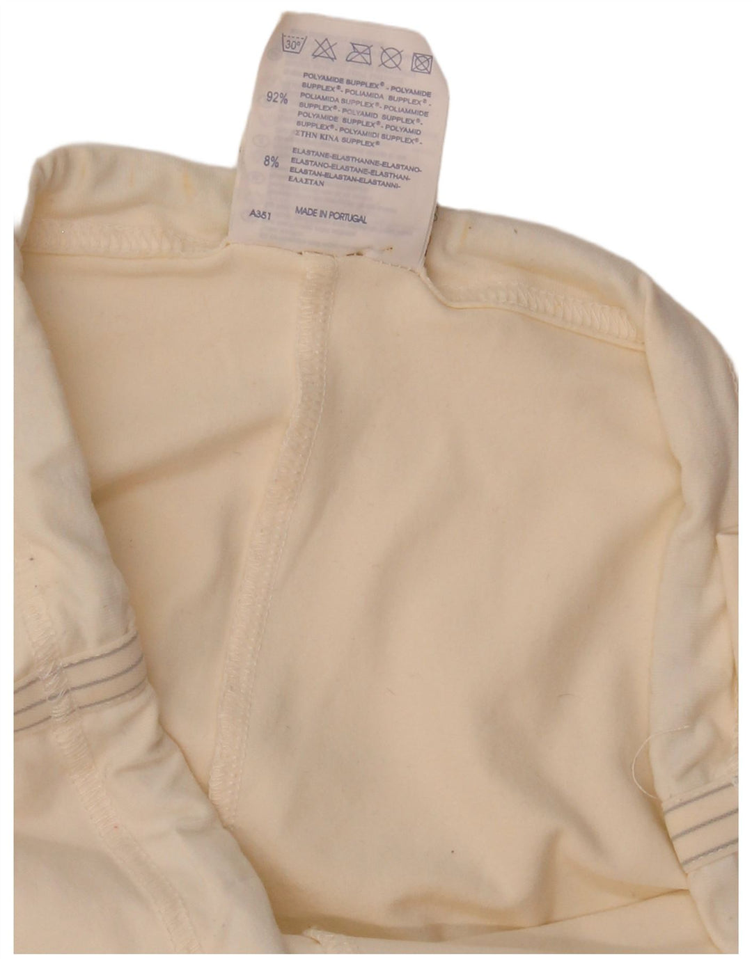 Pantaloni de trening pentru femei Champion Flare UK 12 Poliamidă alb mediu mediu
