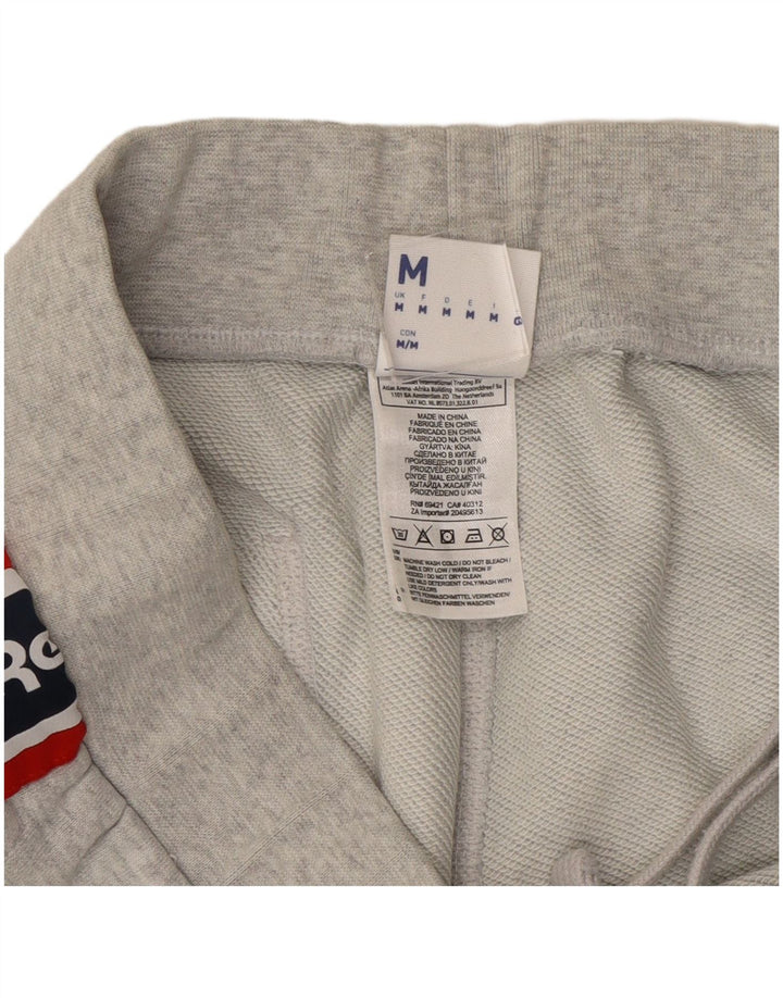 Pantaloni de trening grafic pentru bărbați Reebok Pantaloni de jogging Gri mediu Colorblock
