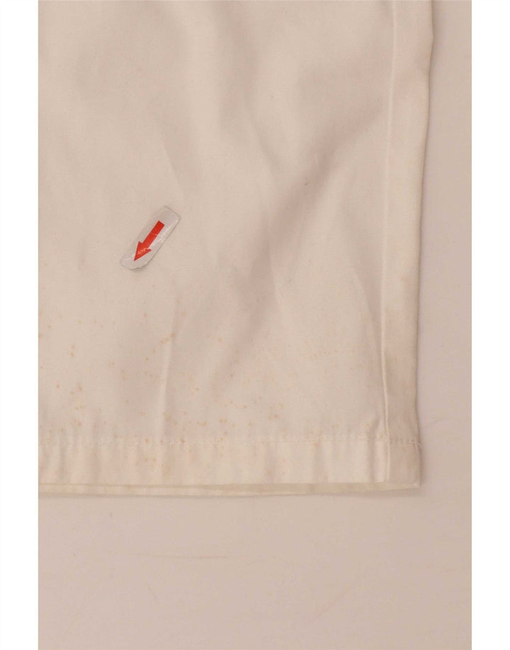 Pantaloni Capri pentru femei Lotto W34 L23 Alb