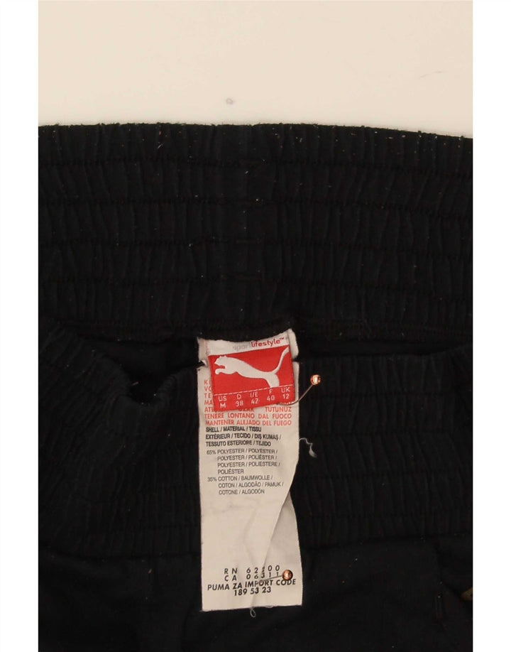 Pantaloni de trening Capri pentru femei Puma Pantaloni de jogging UK 12 Poliester mediu negru