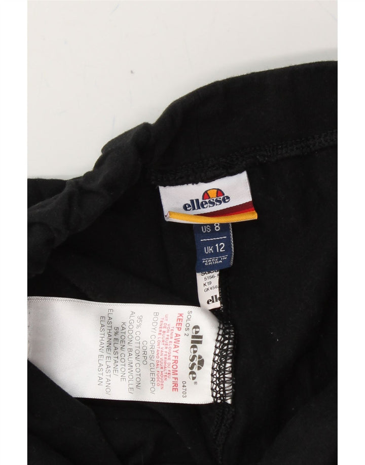 ELLESSE Womens Graphic Leggings UK 12 Medium Black Cotton Vintage Ellesse and Second-Hand Ellesse from Messina Hembry 