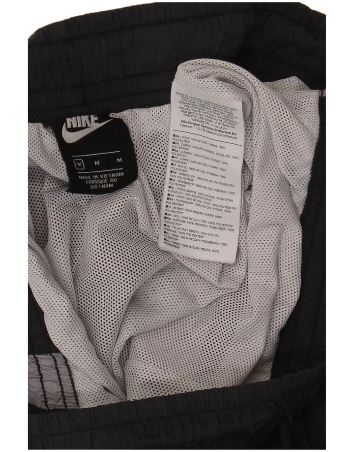 Pantaloni de trening pentru bărbați Nike Pantaloni de jogging Gri mediu Poliamidă bloc de culoare