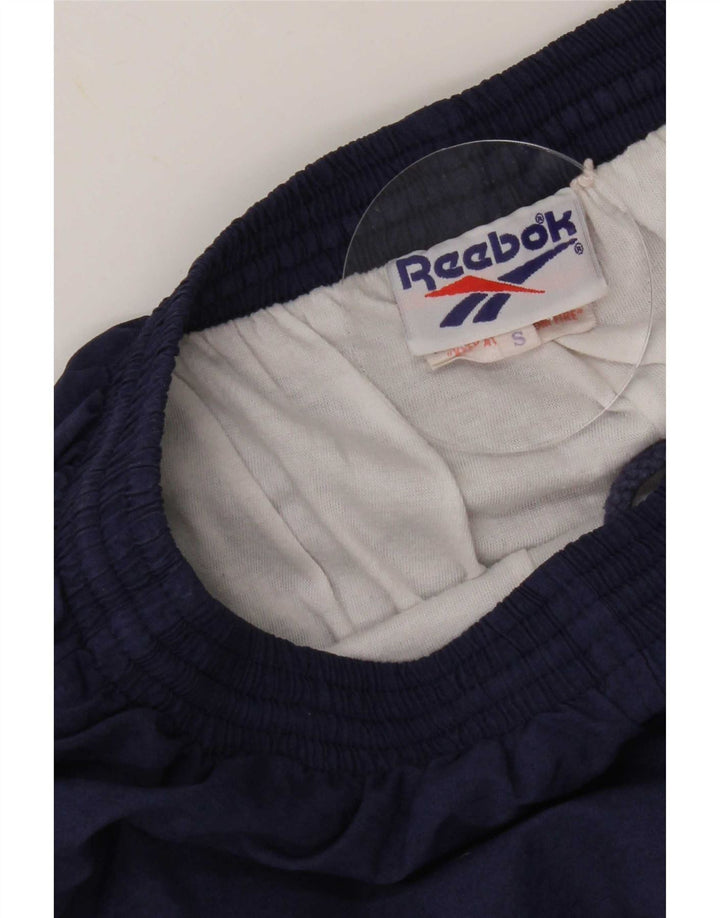 Pantaloni de trening pentru bărbați Reebok Pantaloni de jogging Mici, nailon bleumarin