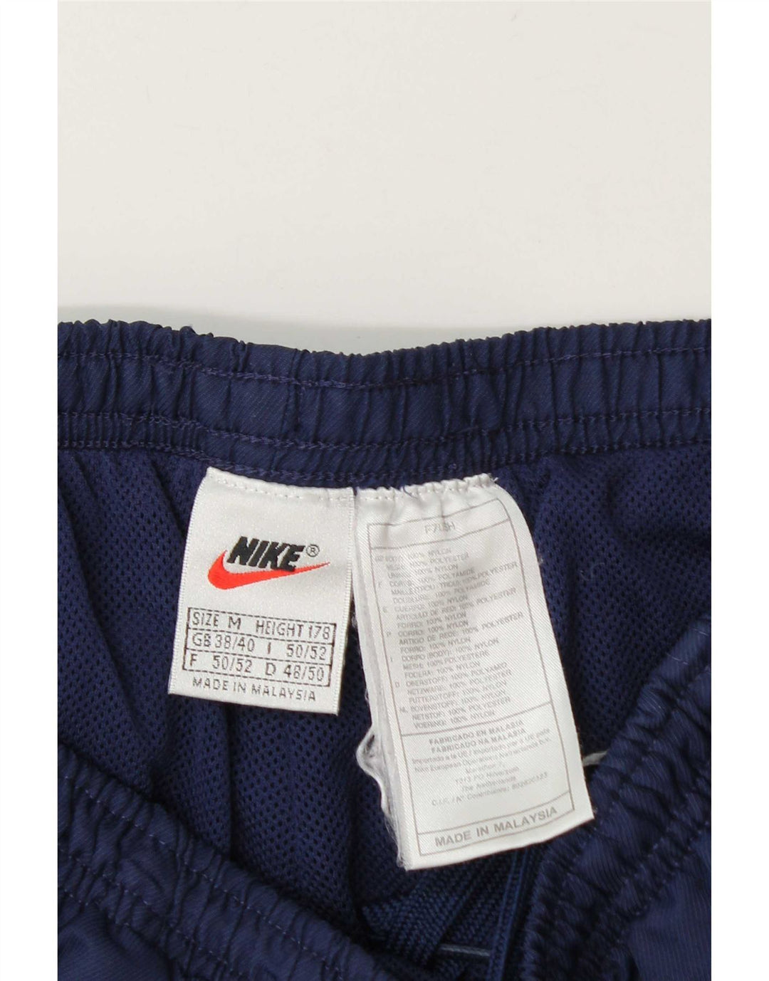 Pantaloni de trening Nike pentru bărbați Marea Britanie 38/40 Nailon mediu albastru bleumarin