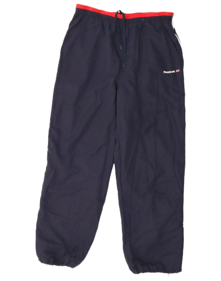 Pantaloni de trening pentru bărbați Reebok Pantaloni de jogging Medium Bleumarin Colorblock