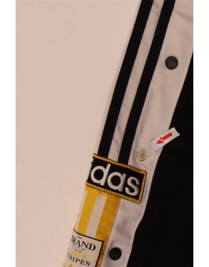 Pantaloni de trening grafic pentru bărbați Adidas, negru mediu, poliester bloc de culoare