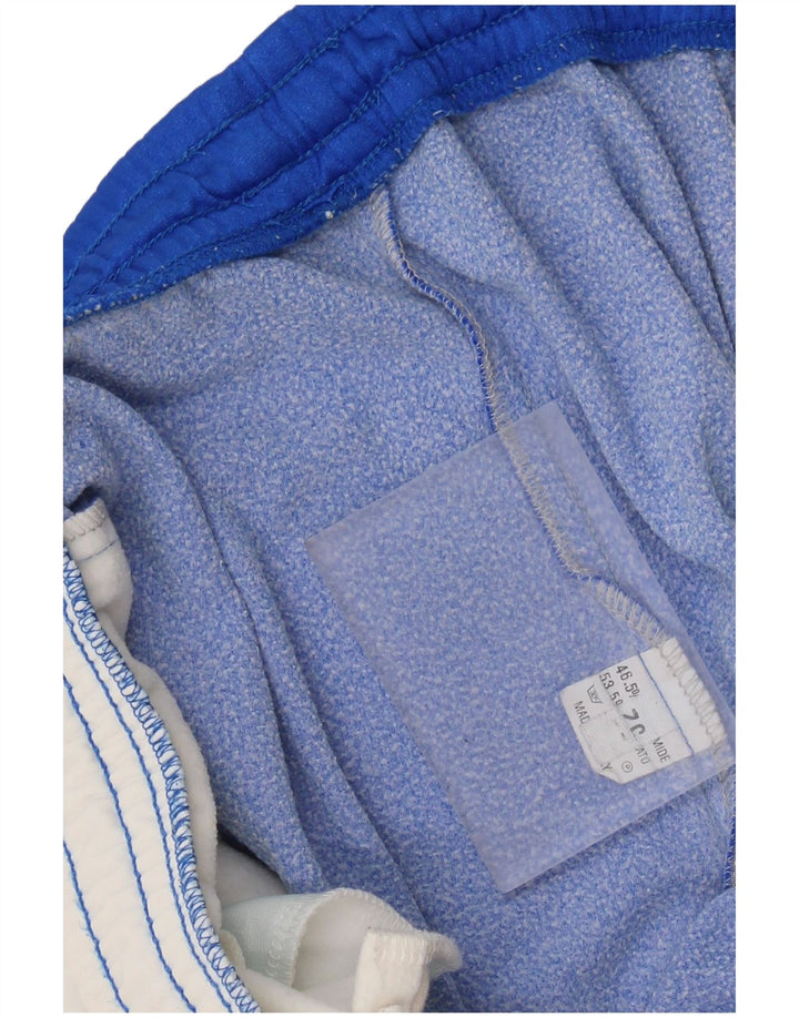 Pantaloni de trening grafic ASICS pentru bărbați Pantaloni de jogging IT 52 XL Albastru Colorblock