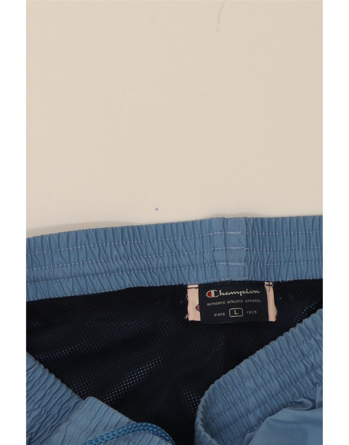 CHAMPION Mens Tracksuit Trousers Large  Blue Polyester Vintage Champion and Second-Hand Champion from Messina Hembry 
