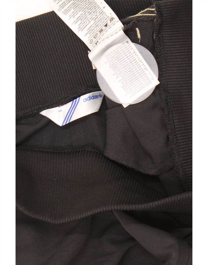 Pantaloni de trening Adidas pentru femei Joggeri UK 14 Poliamidă neagră medie