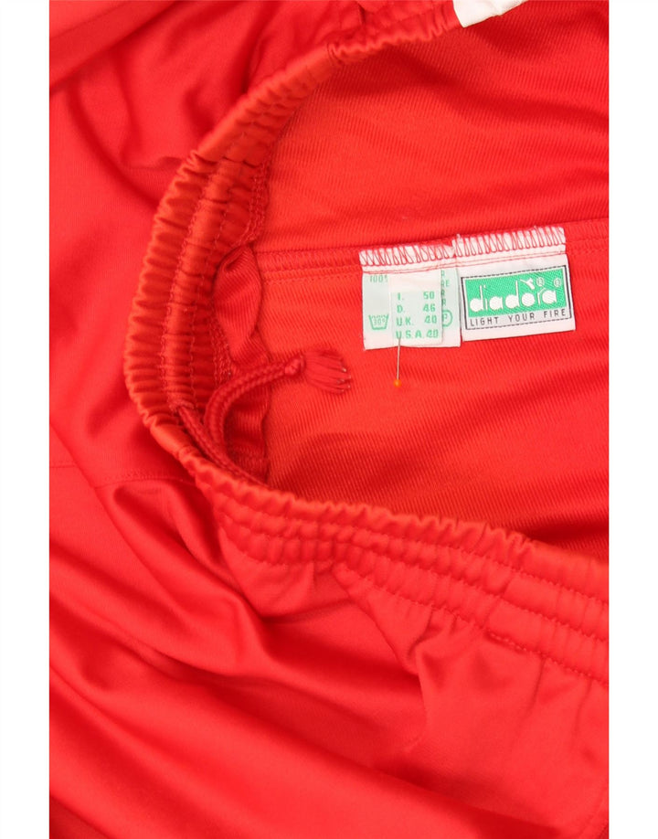 DIADORA Pantaloni de trening grafic pentru bărbați UK 40 Medium Red Colorblock