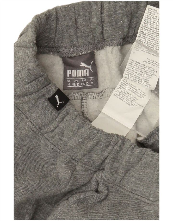Pantaloni de trening Puma Graphic pentru bărbați Joggeri din bumbac gri mediu