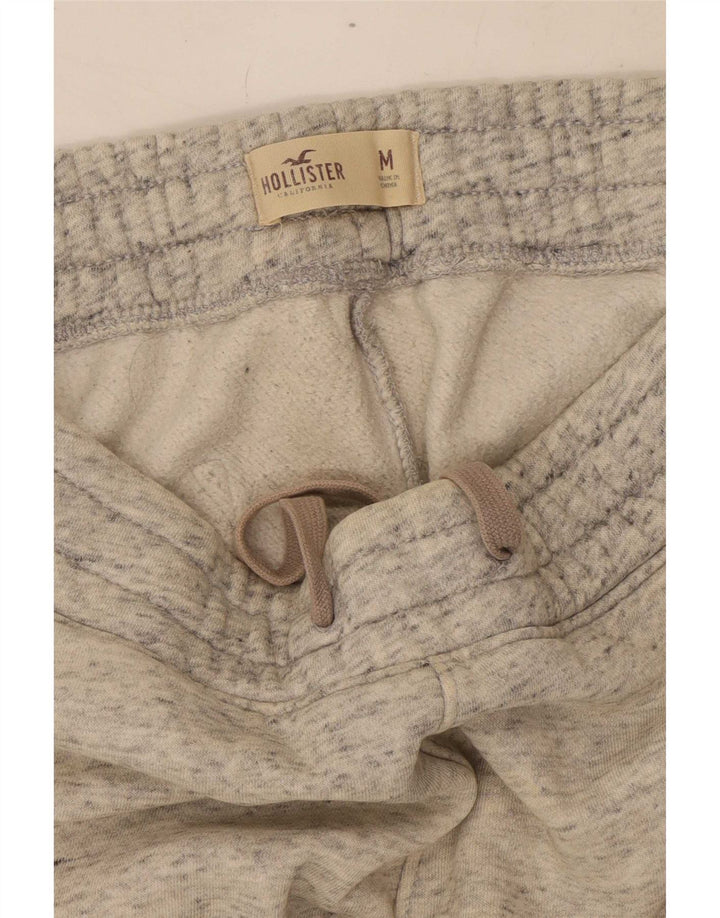 Pantaloni de trening Hollister Graphic pentru bărbați, bumbac cu pete gri mediu
