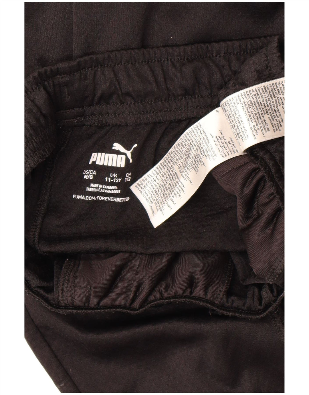 Pantaloni de trening Puma AC Milan pentru baieti 11-12 ani negru geometric