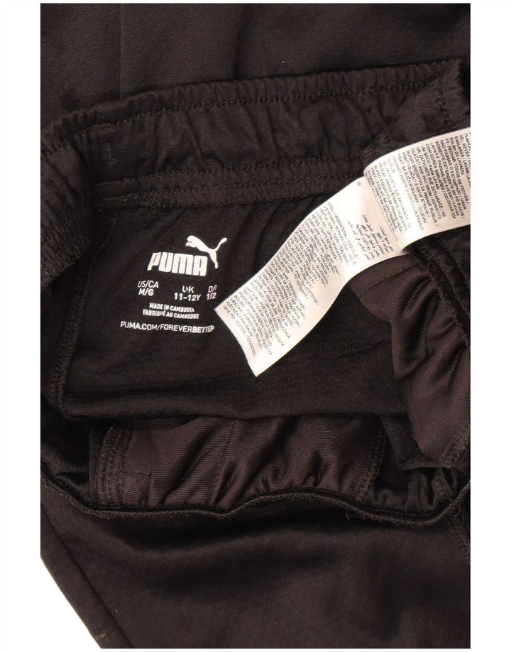 Pantaloni de trening Puma AC Milan pentru baieti 11-12 ani negru geometric