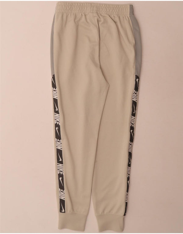 Pantaloni de trening grafic pentru bărbați Nike Joggeri XS Bej Poliester color bloc