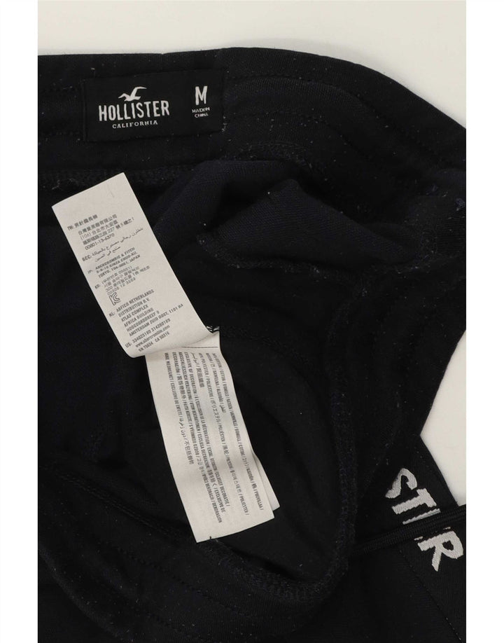 Pantaloni de trening Hollister pentru bărbați cu grafic, bumbac mediu albastru bleumarin