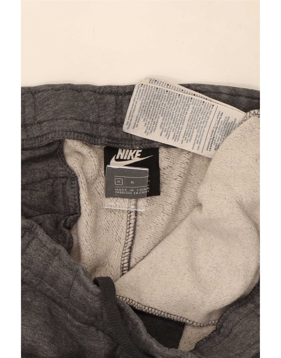 Pantaloni de trening grafic Nike pentru bărbați Joggeri din bumbac gri mediu